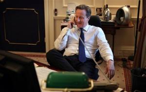 Britain's Prime Minister David Cameron talks to US President Barack Obama on the telephone from his office in Downing Street, London, Thursday Nov. 8, 2012.