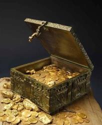 This undated photo provided by Forrest Fenn shows a chest purported to contain gold dust, hundreds of rare gold coins, gold nuggets, and other artifacts. 