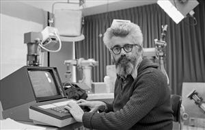 In this March 7, 1974 photo provided by the Stanford news Service, John McCarthy, professor of computer science, works at the artificial intelligence lab in Stanford, Calif.