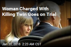 Woman Charged With Killing Twin Goes on Trial